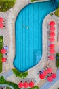 drone view from above at a couple swimming in an infinity pool on a luxury vacation in Thailand Royalty Free Stock Photo