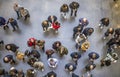 View from above of crowd of people waiting to enter a fairground