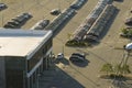 View from above of dealers outdoor parking lot with many brand new cars in stock for sale. Concept of development of Royalty Free Stock Photo