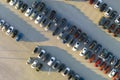 View from above of dealers outdoor parking lot with many brand new cars in stock for sale. Concept of development of Royalty Free Stock Photo