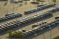 View from above of dealers outdoor parking lot with many brand new cars in stock for sale. Concept of development of Royalty Free Stock Photo