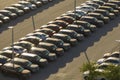 View from above of dealers outdoor parking lot with many brand new cars in stock for sale. Concept of development of Royalty Free Stock Photo