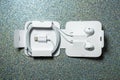 View from above at the EarPods, wired earbuds with Lightning connector in the