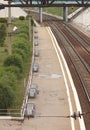 A view from above of an empty platform with benches at the railway station after rain in Novosibirsk in Russia