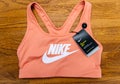 View from above of female Nike Swoosh bra