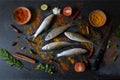 View from above of fish with vegetables and spices Royalty Free Stock Photo