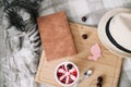 View from above of funny cat sleeping on the blanket. Cozy Flatlay of female blogger.