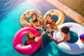 Children party and drink soda swim in pool