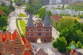 View from above on Holsten Gate or Holstentor in German town Lubeck. Medieval gate Royalty Free Stock Photo