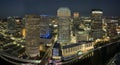 View from above of illuminated skyscraper buildings, pedestrian riverwalk and street traffic in downtown of Tampa city Royalty Free Stock Photo