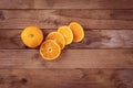 View from above on juicy orange tangerines, which are placed on a wooden background Royalty Free Stock Photo