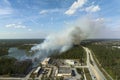 View from above of lagre wildfire burning severely in North Port city, Florida. Hot flames in forest with toxic smoke Royalty Free Stock Photo