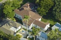 View from above of large residential houses in closed living golf club in south Florida. American dream homes as example