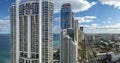 View from above of luxurious highrise hotels and condos on Atlantic ocean shore in Sunny Isles Beach city. American