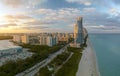 View from above of luxurious highrise hotels and condos on Atlantic ocean shore in Sunny Isles Beach city in the evening
