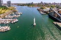 A view from above on a modern city with a waterfront, high-rise