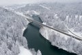 View from above on motorway bridge over the dark blue river Lech