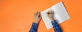 view from above, person taking down the notes in notebook, empty blank paper mockup with copy space Royalty Free Stock Photo