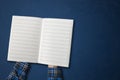 view from above, person taking down the notes in notebook, empty blank paper mockup with copy space Royalty Free Stock Photo