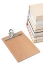 View from above on a pile of books with wooden message board