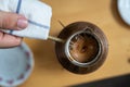 View from above of the preparation of a Turkish coffee, on wooden table Royalty Free Stock Photo