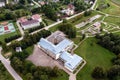 Aerial view to the small Latvian town Auce, two schools, a bicycle track and a residential area