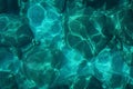 View from above to stony seabed in clear water with abstract blue green pattern Royalty Free Stock Photo