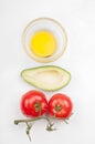 View from above to the tomatoe, avocado, olive oil