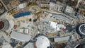 View from above, top down aerial view of a construction site with cranes in Kuala Lumpur, Malaysia