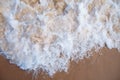 View from above on water froth, foam from wave on sand