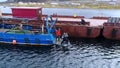 View from above wharf on water surface on Stts Dalniye Zelentsy in Barents Sea.