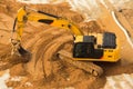 Working Excavator Tractor Digging A Trench. Royalty Free Stock Photo