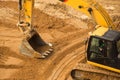 Working Excavator Tractor Digging A Trench. Royalty Free Stock Photo