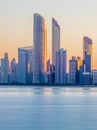 View of the Abu Dhabi Skyline from the Corniche during Sunrise Royalty Free Stock Photo