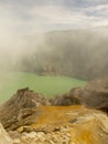 View on the acidic crater lake of the Ijen volcano in Indonesia, a sulfur mine and toxic gaz Royalty Free Stock Photo