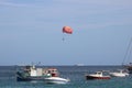 Boat parasailing over Mellieha Bay, Malta
