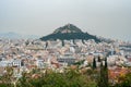 View from Acropolis on cityscape of Athens and Lycabettus Hill, known as Lykabettos Royalty Free Stock Photo