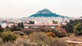 View from Acropolis on cityscape of Athens and Lycabettus Hill, known as Lykabettos Royalty Free Stock Photo