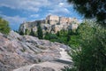 View of Acropolis hill from Areopagus hill on summer day with great clouds in blue sky, Athens, Greece. UNESCO world Royalty Free Stock Photo