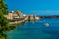 A view across the bay towards Castello Maniace on Ortygia island in Syracuse, Sicily