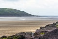 A view across the beach and river Towy estuary at Llansteffan, Wales