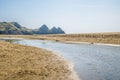 A view across the beach at Three Cliffs Bay, Gower Peninsula, Swansea, South Wales Royalty Free Stock Photo