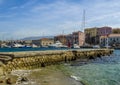 A view across the breakwater in Chania harbour, Crete on a bright sunny day Royalty Free Stock Photo