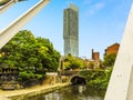A view across a canal bridge in the restored Victorian canal system in Castlefield, Manchester, UK Royalty Free Stock Photo