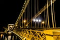 A view across the Chain Bridge across the River Danube in Budapest at night Royalty Free Stock Photo