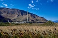 View Across A Field Of Natural Grassland Of A Copper Smelting Plant And It`s 1,215 Foot High Smokestack.