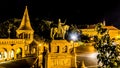 The view across the Fisherman`s Bastion towards the Castle District in Budapest at night Royalty Free Stock Photo