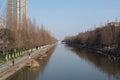 View across the Hanshui River in Xiantao, pedestrians walk along the banks