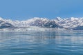 A view across the icy waters of Disenchartment Bay towards in the Valerie Glacier, Alaska Royalty Free Stock Photo