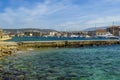 A view across an internal breakwater in Chania harbour, Crete on a bright sunny day Royalty Free Stock Photo